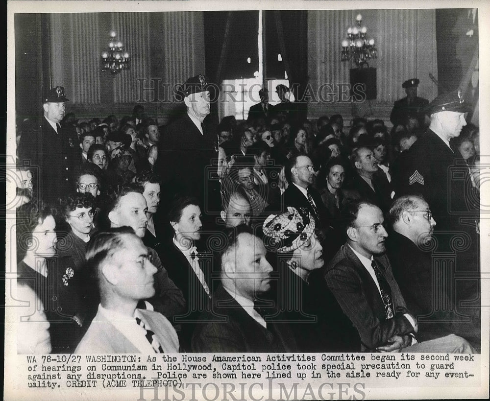 1947 Police lined up at the UnAmerican Activities committee hearing. - Historic Images