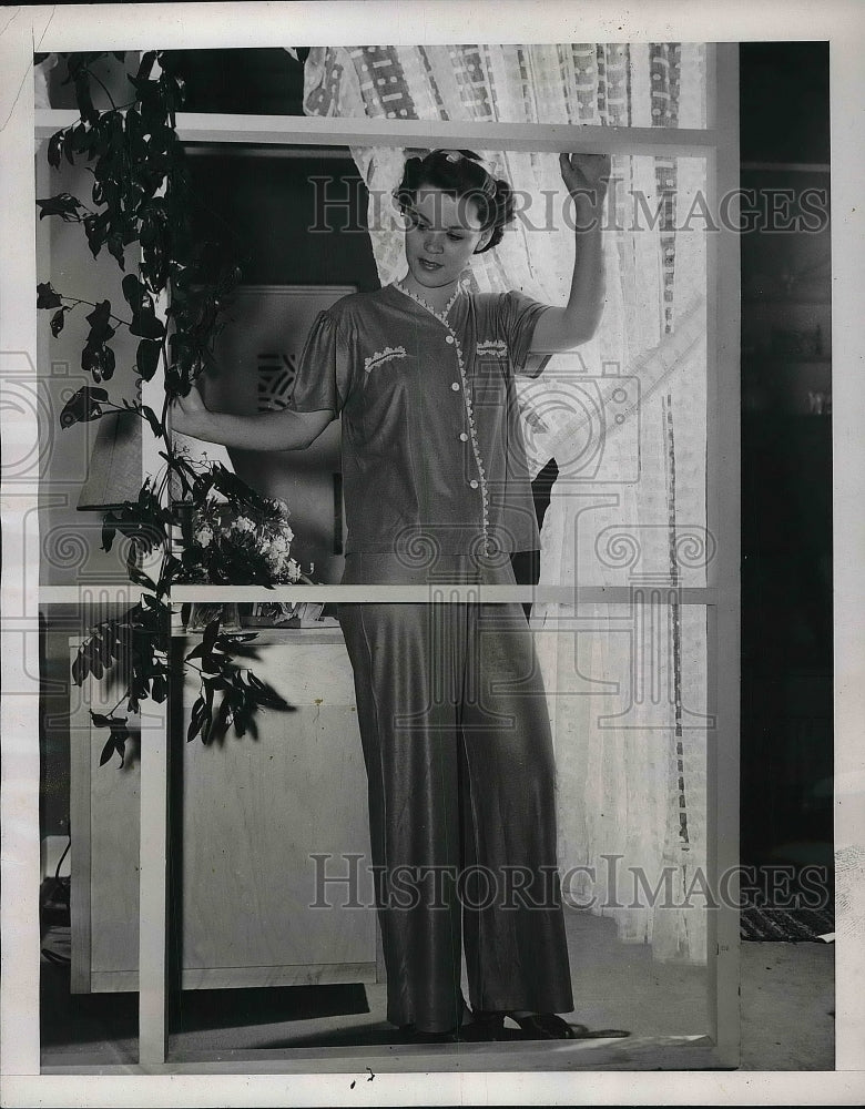 1939 Model wearing flannelette nightgown  - Historic Images