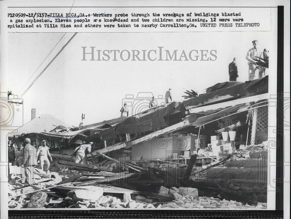 1957 Workers at the wreckage of bldg.blasted in gas explosion ...