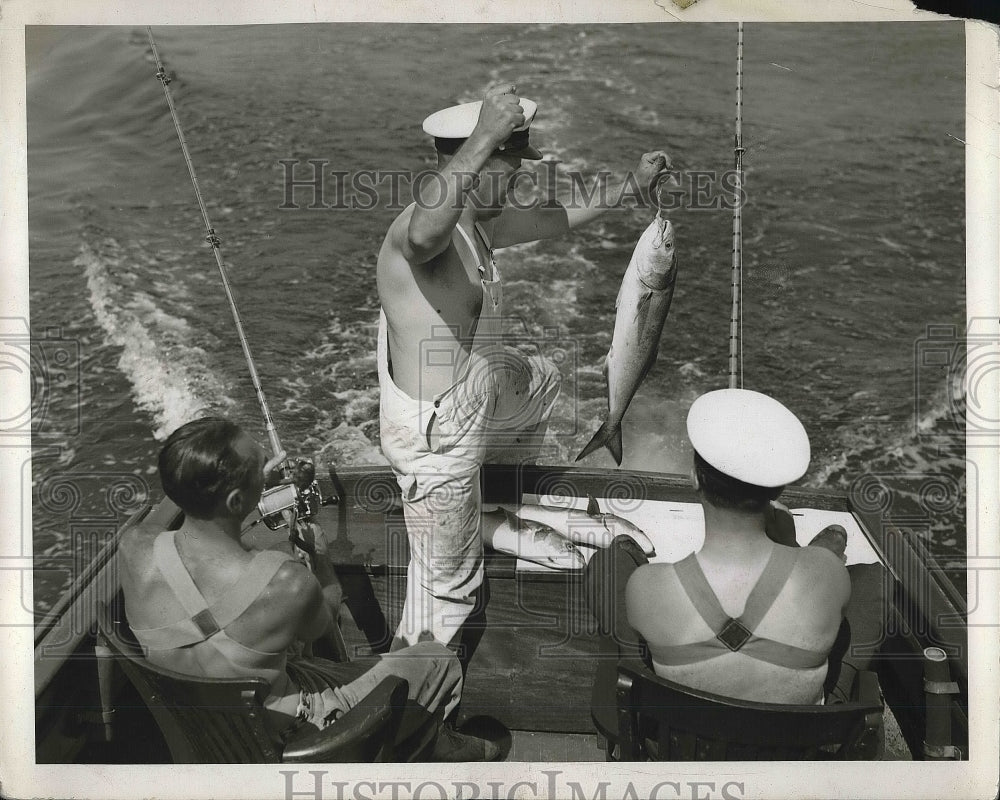 1937 Press Photo Fisherman caught a big fish. - nea79519 - Historic Images