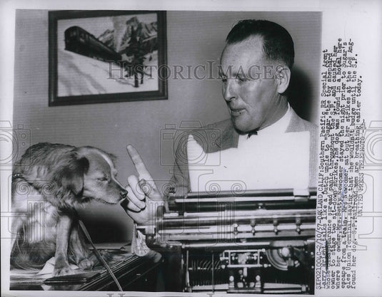 1957 Oakland, Calif. Larry Wright of S Pacific RR & toy shepherd - Historic Images