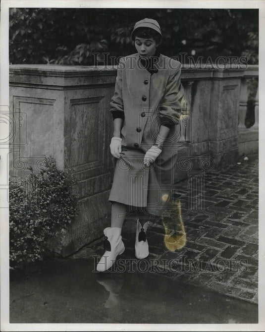 1953 Rain boots inspired by band majorettes footwear  - Historic Images