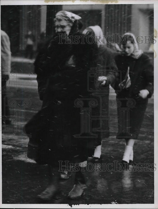 1958 pedestrians in cold, wet weather in Cleveland  - Historic Images