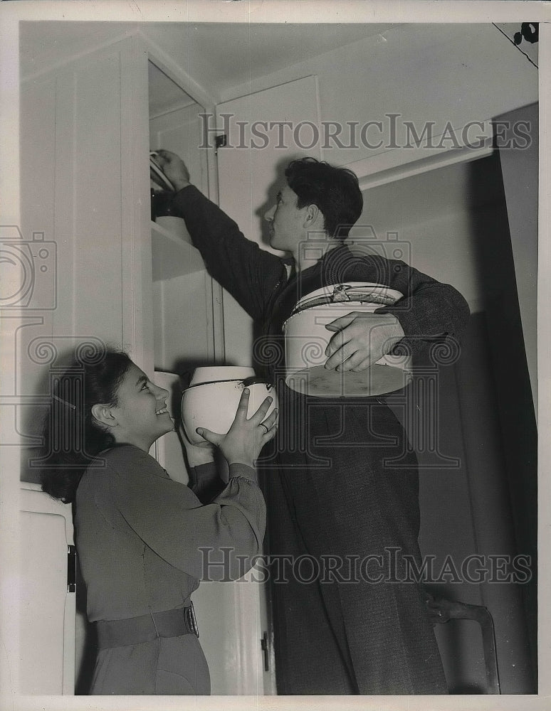 1937 Charlotte Lerkowitz and Benny Kapplan Setting up Apartment - Historic Images