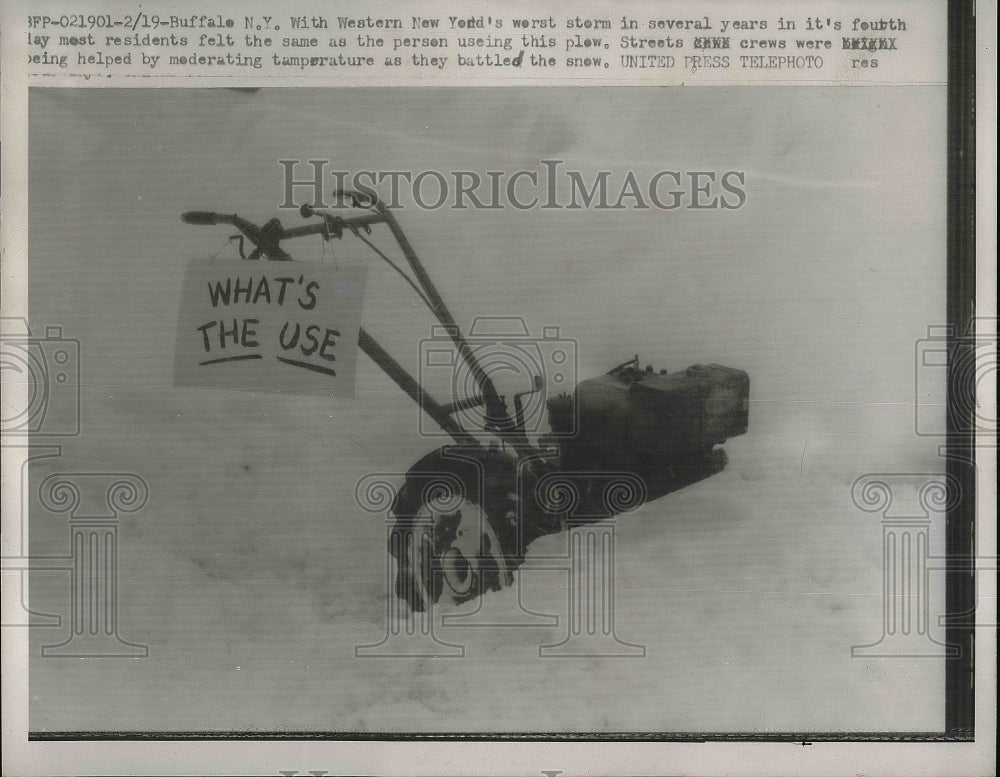 1958 Press Photo Snow Plow Surrounded by Snow and &quot;What&#39;s The Use&quot; Sign - Historic Images