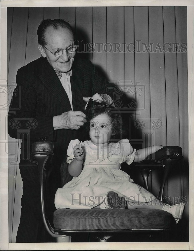1948 Press Photo P. V. Senegas, 81, Hairdresser, Binnie Jane Mills, 1-year-old - Historic Images
