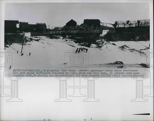 1952 passenger train overturned during earthquake, Kokkaido, Japan - Historic Images