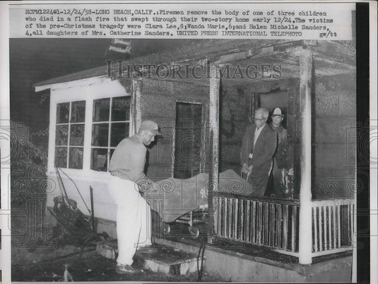 1958 Press Photo Long Beach California Firemen Remove children Flash Fire - Historic Images