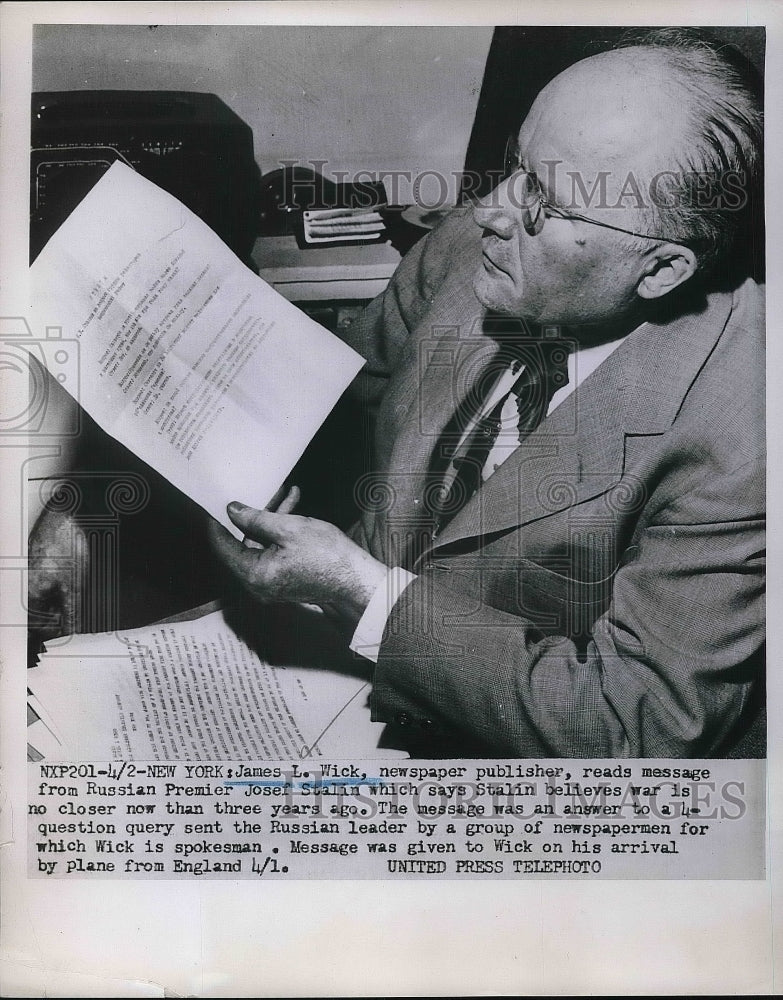 1952 James L. Wick Newspaper Publisher Reading Message From Russia - Historic Images