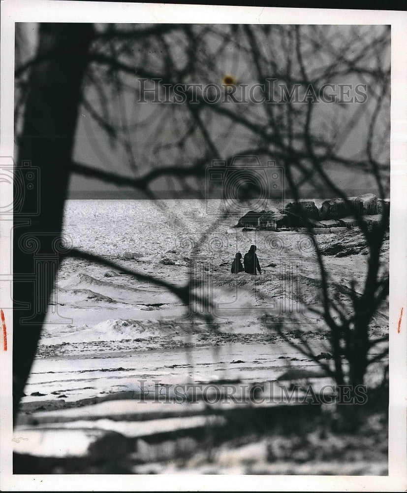1958 Boys on the iced over Edgewater lake in Ohio  - Historic Images