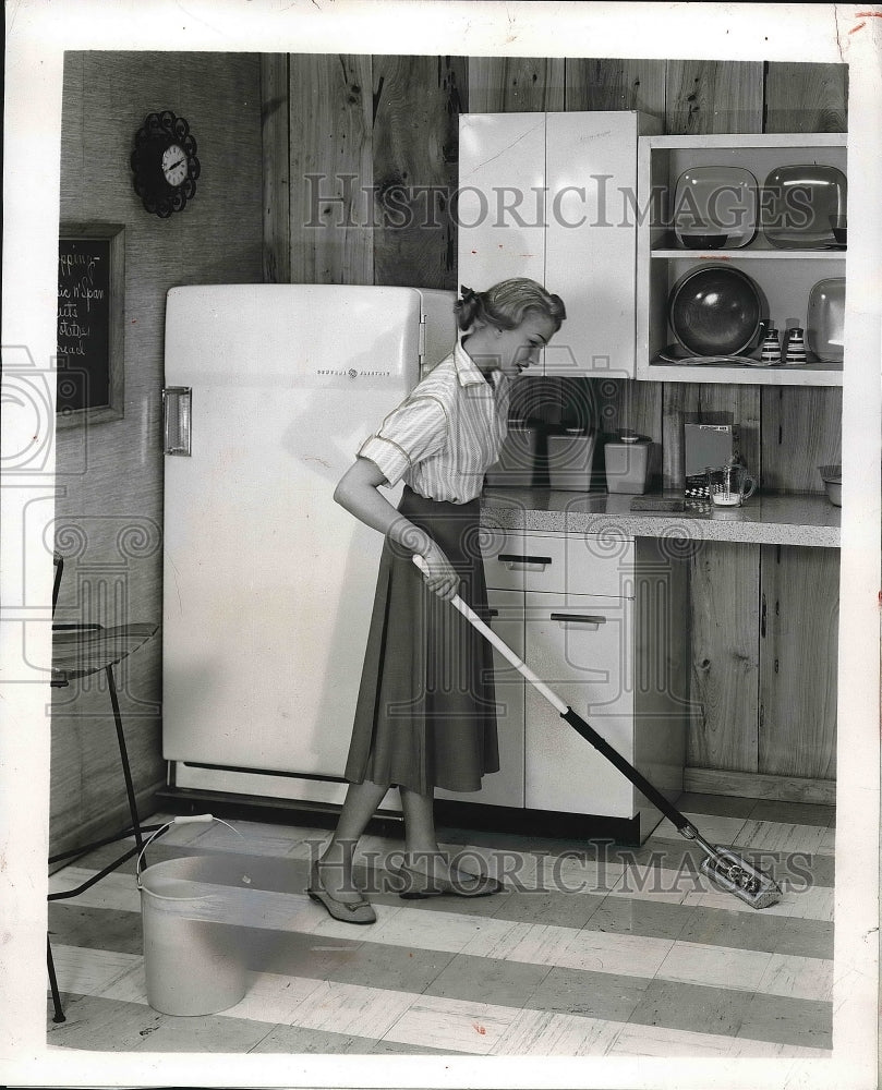 1957 Model Using Floor Mop for Advertisement  - Historic Images