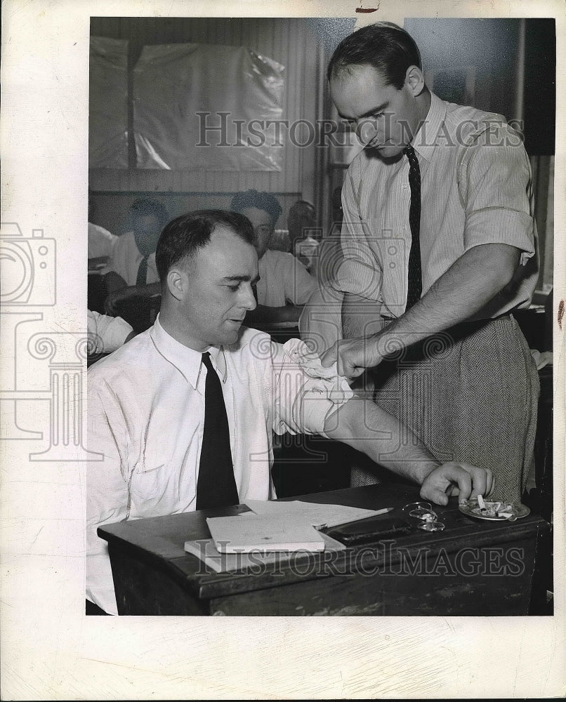 1941 Press Photo Donald Stone Red Cross Harry Mulcahy Giving Blood - nea82346 - Historic Images