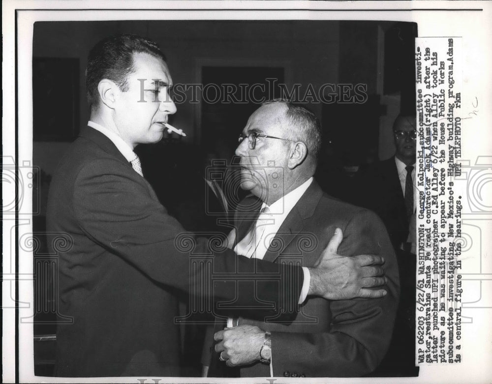 1961 George Kolpecki restrains Sante Fe Road Contractor Jack Adams - Historic Images