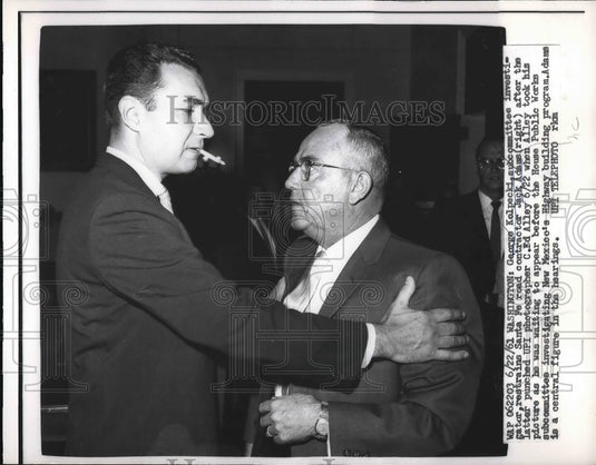 1961 George Kolpecki restrains Sante Fe Road Contractor Jack Adams - Historic Images