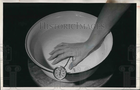 1953 Rapid warming of a frostbitten part of body recommended - Historic Images