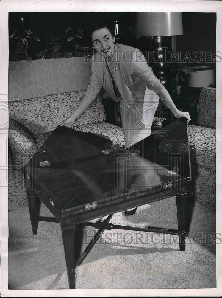 1953 Pat Feeley with your new cocktail table  - Historic Images