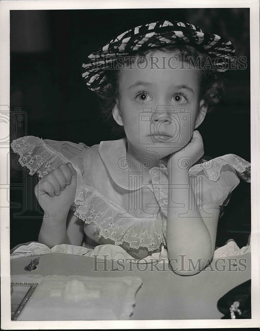 1962 A young girl and children's fashion  - Historic Images