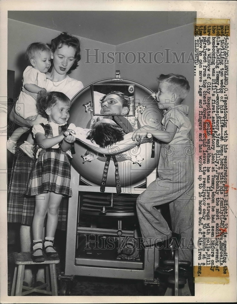 1949 Cleveland, Ohio Bill Lichtle in his iron lung as family visits - Historic Images