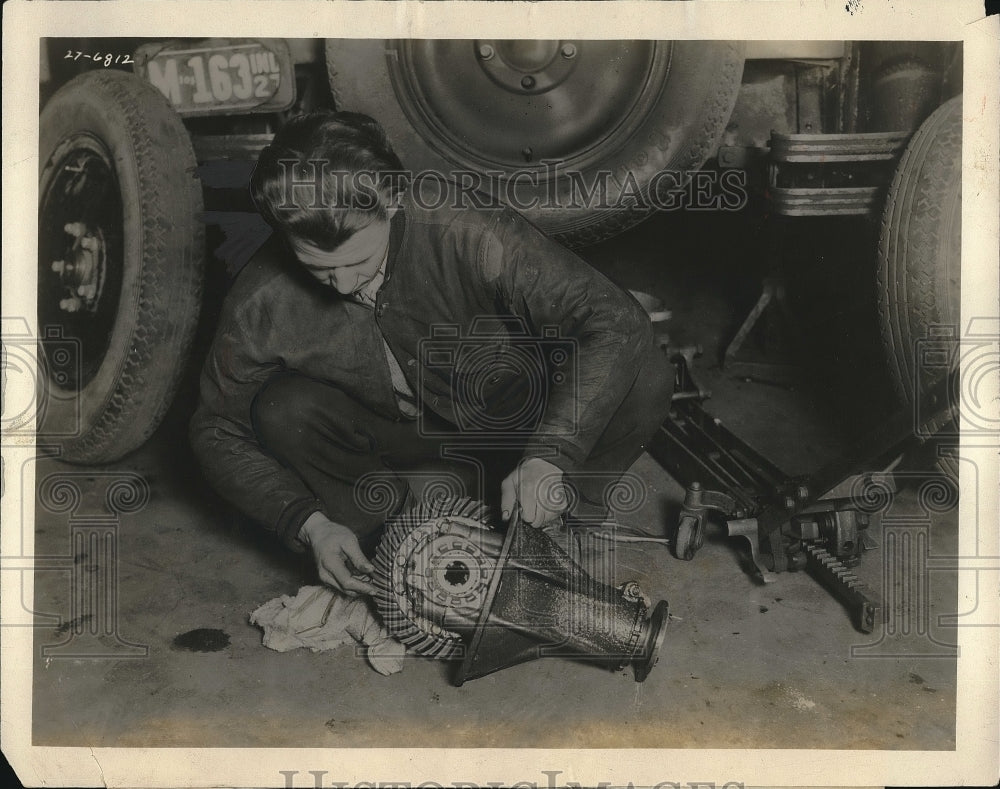 1928 Man with a Studebaker dealer's parts stock  - Historic Images