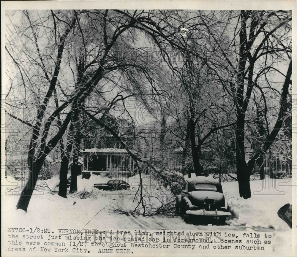 1948 Press Photo Fallen Tree Limb Almost Hitting Car in Wintery Mt. Vernon - Historic Images