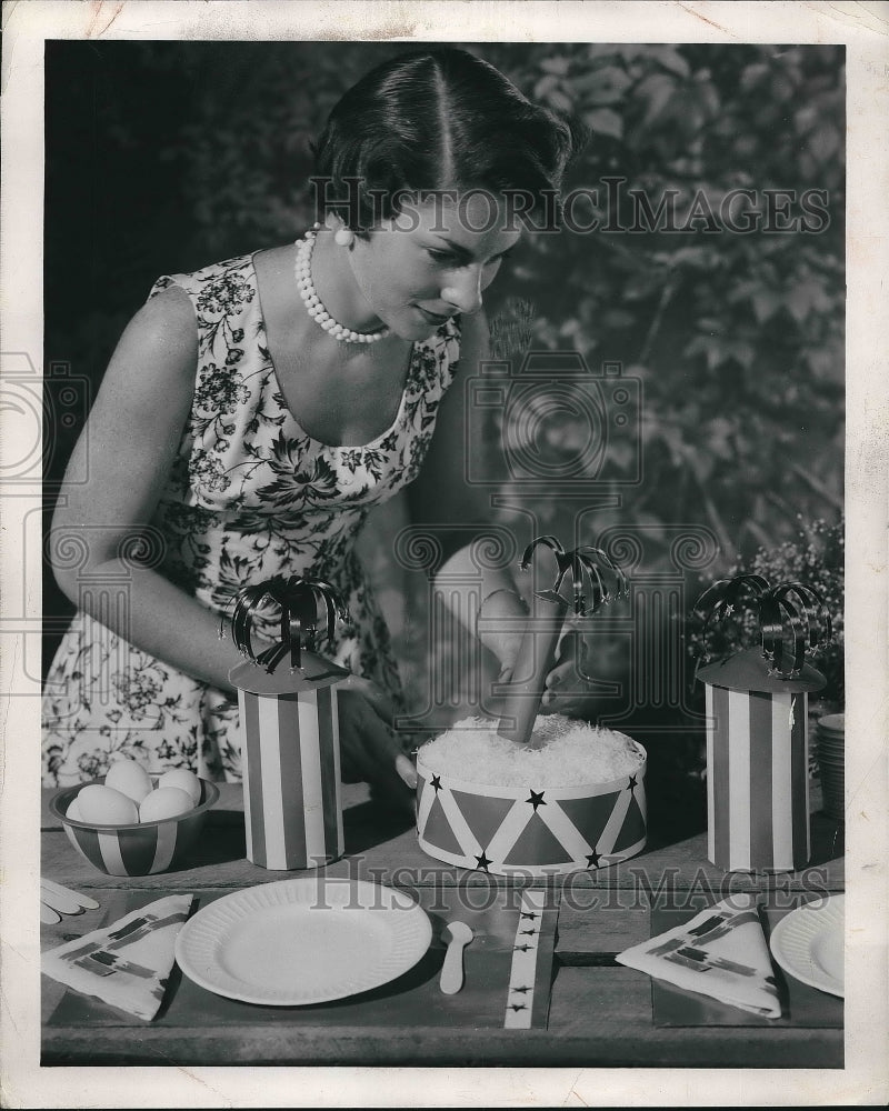 1955 woman making Fourth of July table decorations  - Historic Images