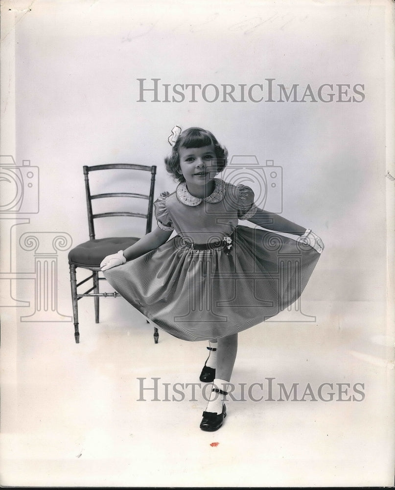 1953 girl modeling Celanese taffieta dress  - Historic Images