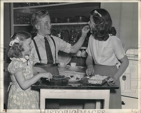 1939 Mrs. Peurosolyly & Children Baking In Kitchen  - Historic Images