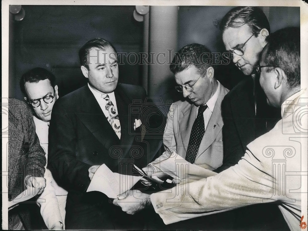 1949 Sen. J Howard McGrath with reporters  - Historic Images