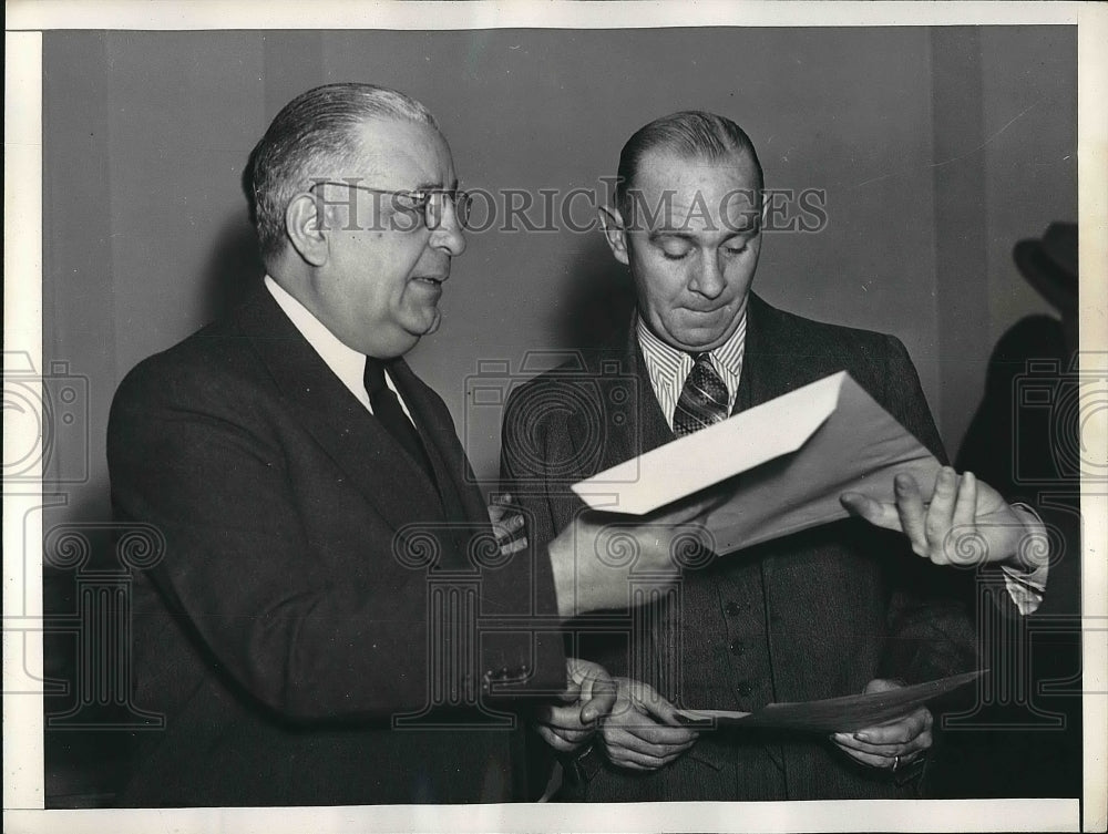 1937 County Clerk Albert Marlnell speaking with reporters - Historic Images