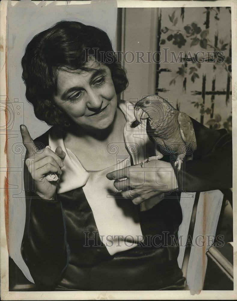 1932 Ms. Henriette Wade with and parrot Bobbie  - Historic Images