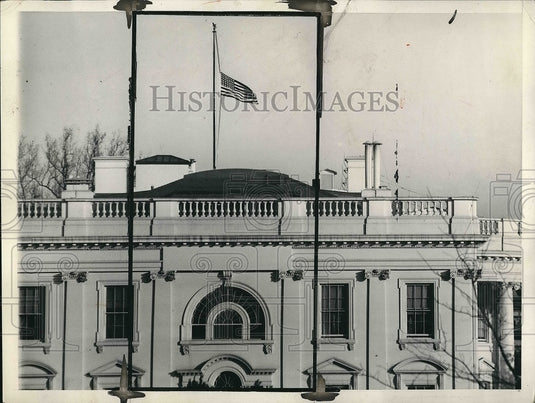 1933 White House flag flying at half mast for Coolidge  - Historic Images