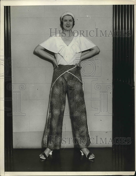 1930 Press Photo A woman showing off her blouse - Historic Images