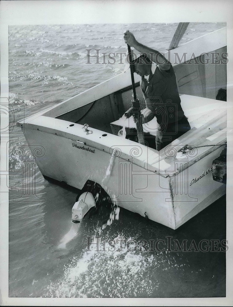 An Aviators Checklist Making Sure Motor Is Enclosed In Boat - Historic Images
