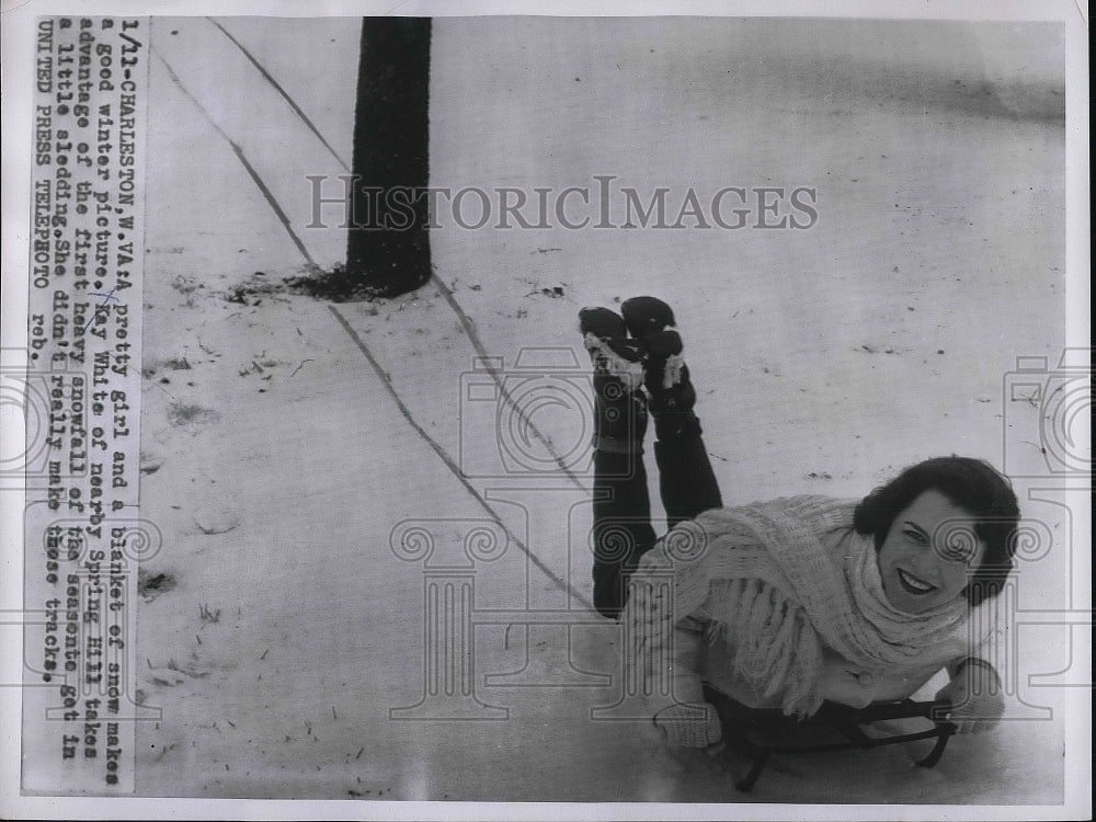 1956 Kay whit sledding in Charleston WV  - Historic Images