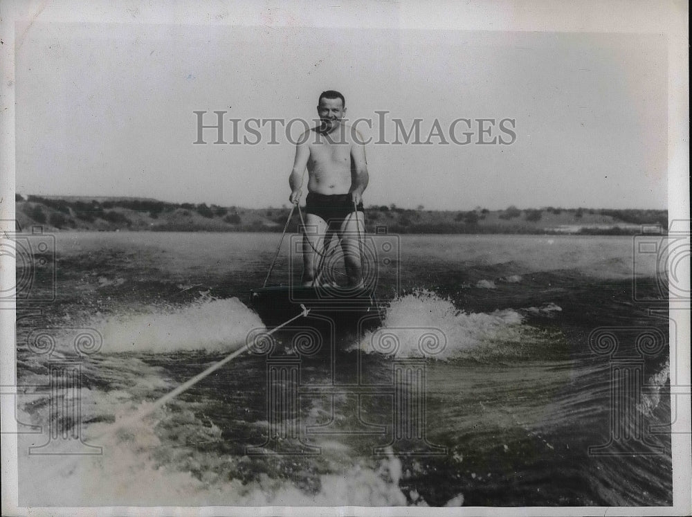 1937 Gov. James Allred of Texas waterskiing  - Historic Images