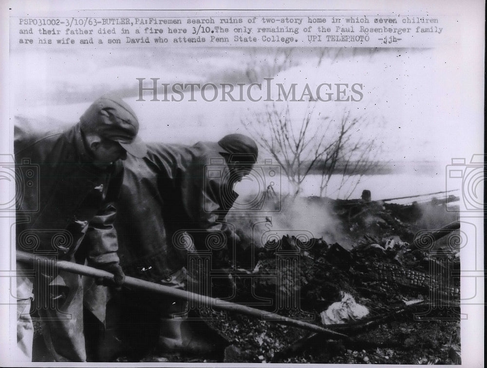 1963 Firemen search ruins of home in which 7 children, father died - Historic Images