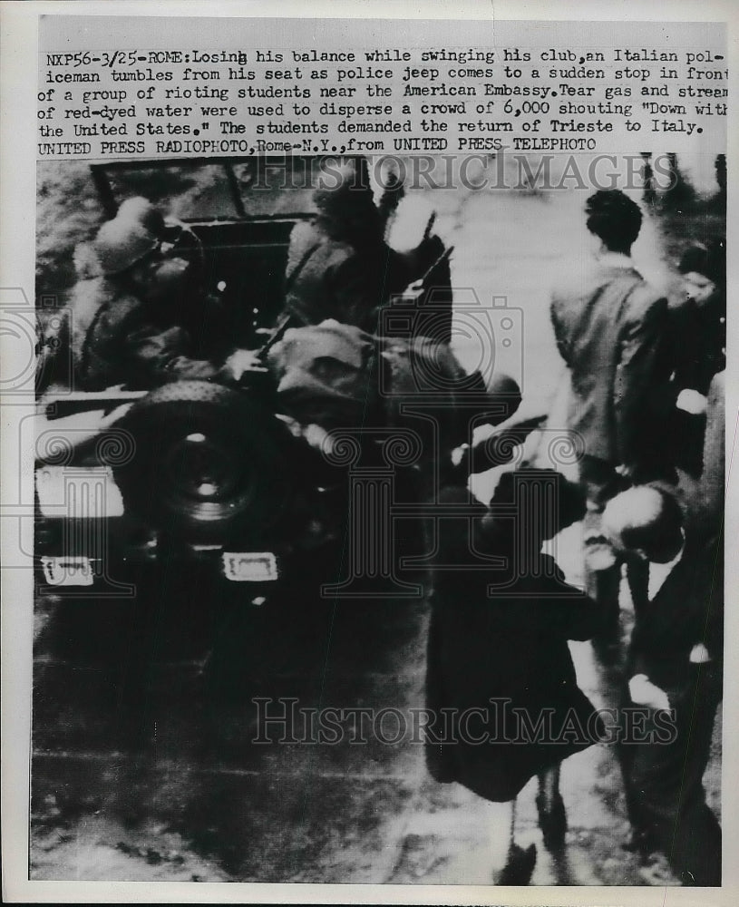 1952 Press Photo Rome, Italy policeman falls out of his jeep at riot - nea86364-Historic Images