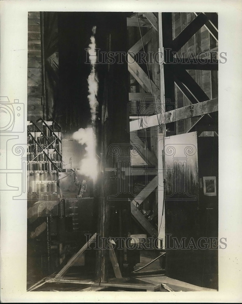 1938 Press Photo Path of a lightning stroke through inside of transmission pole - Historic Images