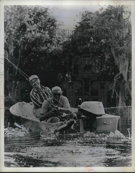 1967 Getting a fish on takes frantic proportions in "Jump Fishing" - Historic Images