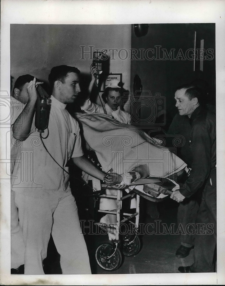 1949 Press Photo Rocco Natrone arriving at the hospital - nea87308 - Historic Images
