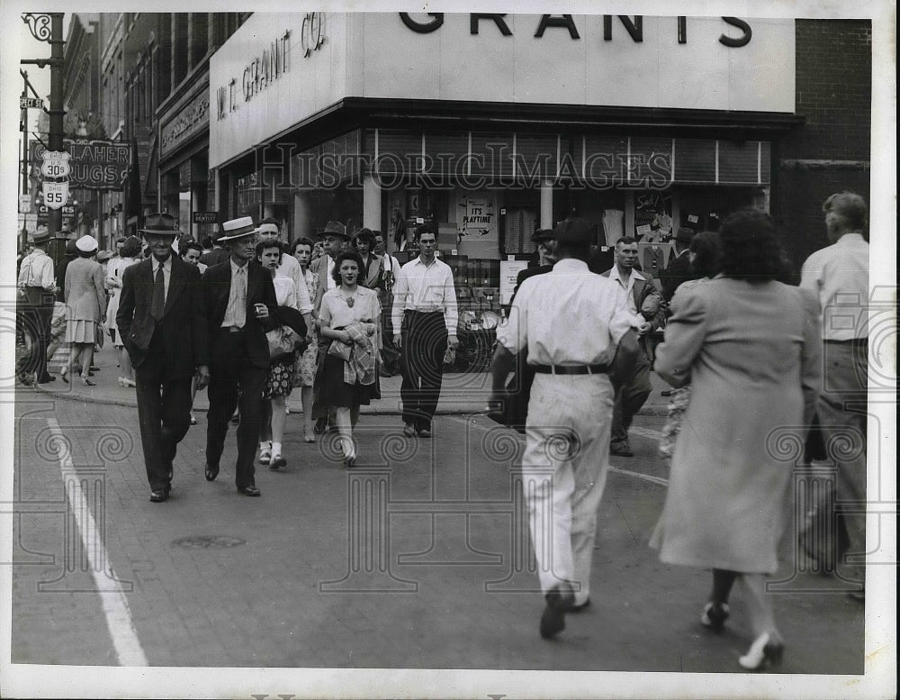 1942 Busy Street Corner with Pedestrians in a Country Town - Historic Images