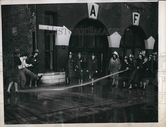 1948 Glen Pierce being sprayed with water  - Historic Images