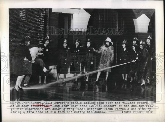1948 Bachelor Glen Pierce being sprayed with water  - Historic Images