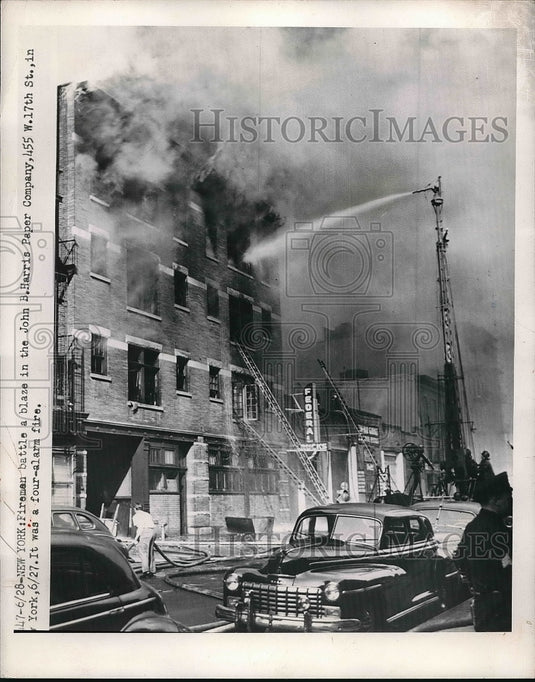 Press Photo Fireman Battle blaze in John B. Harris Paper Company New York - Historic Images