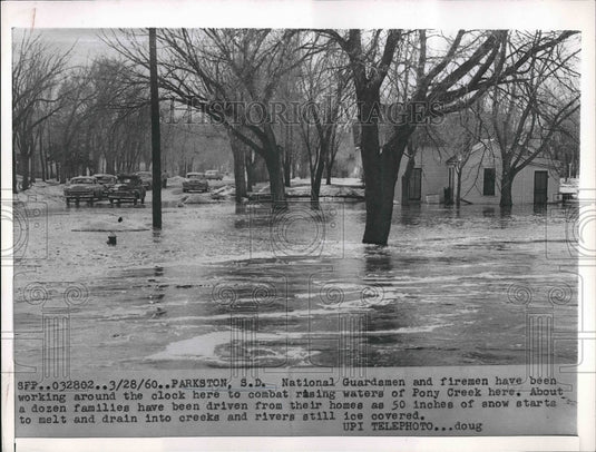 1960 National Guardsmen & Firemen Work To Evacuate People - Historic Images