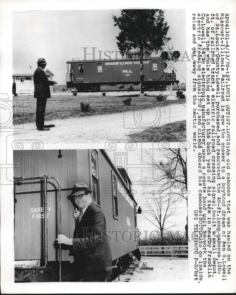 1970 Ben Lowell restores old caboose and sets it up in backyard - Historic Images