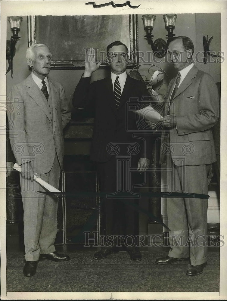 1937 Robert H.Lucas sworn as Commissioner of Internal Revenue. - Historic Images