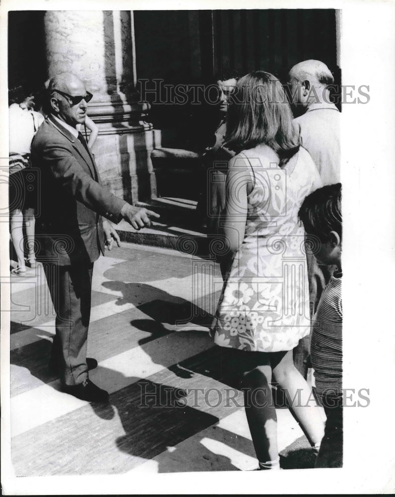 1971 decorum police stop miniskirt girl from entering Vatican - Historic Images