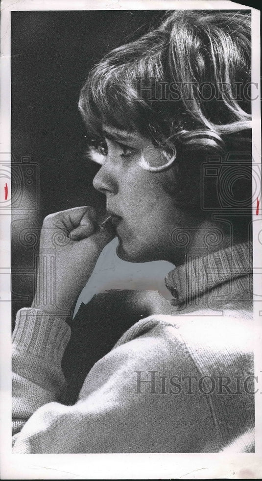 Press Photo A woman biting her nails at cheerleading competition - nea89270 - Historic Images