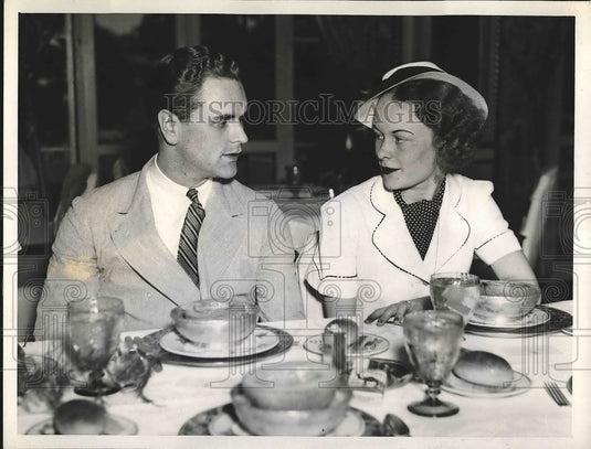 1937 John A. Stewart & Miss Howes at a dinner  - Historic Images